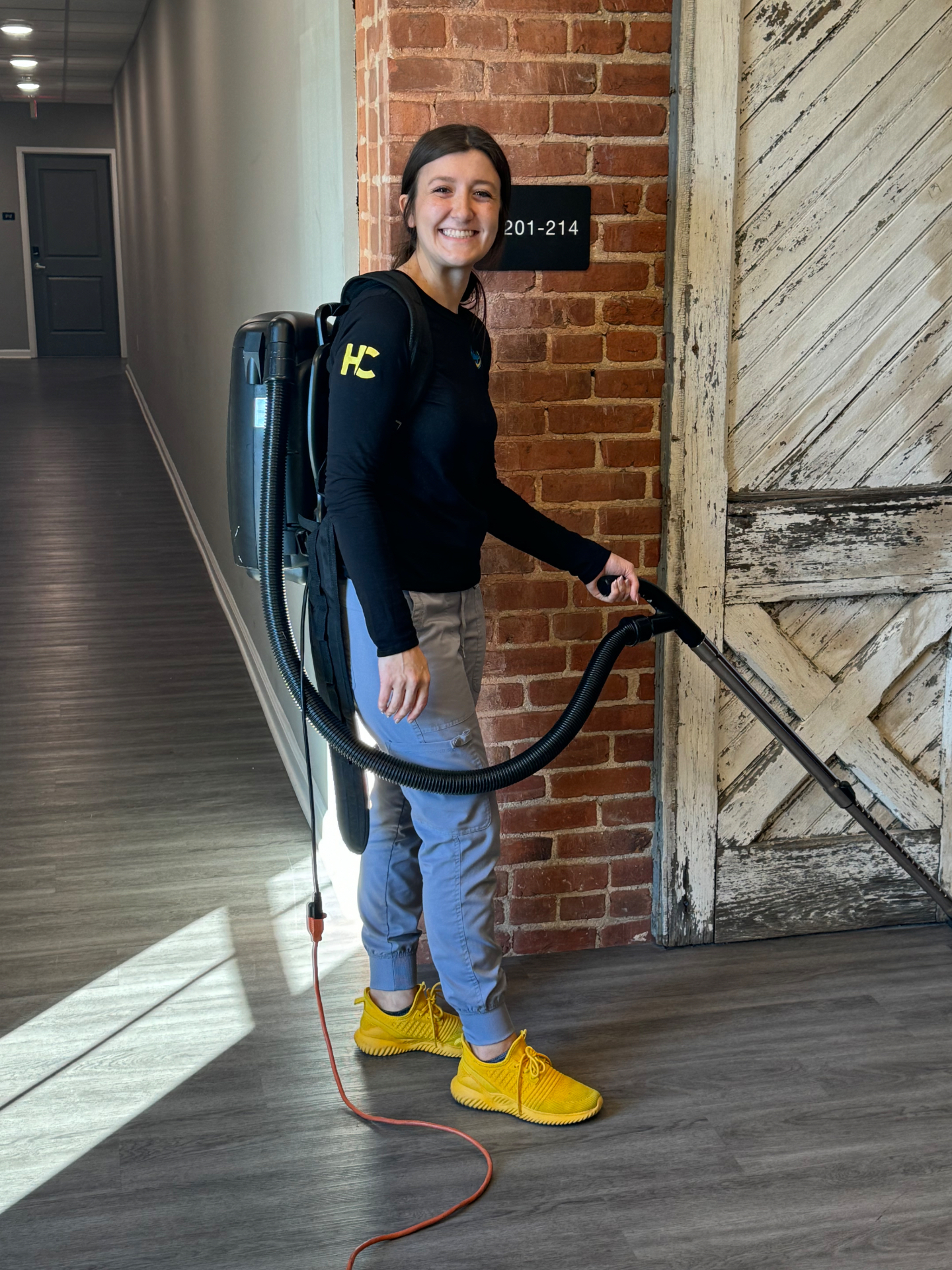 Haley in branded HC uniform on the job