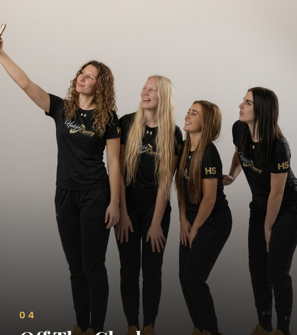 Four Haley's teammates in branded uniforms standing shoulder-to-shoulder with arms crossed